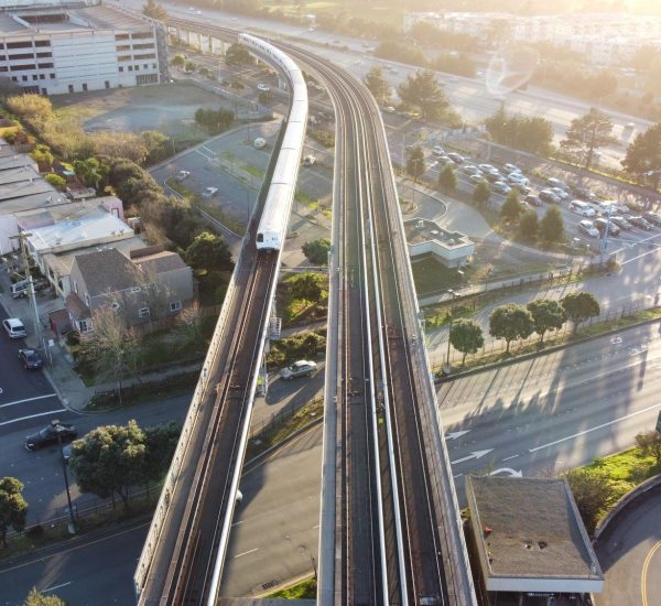 aerial-shot-san-francisco-bay-area-rapid-transit-train-approaches-daly-city-station